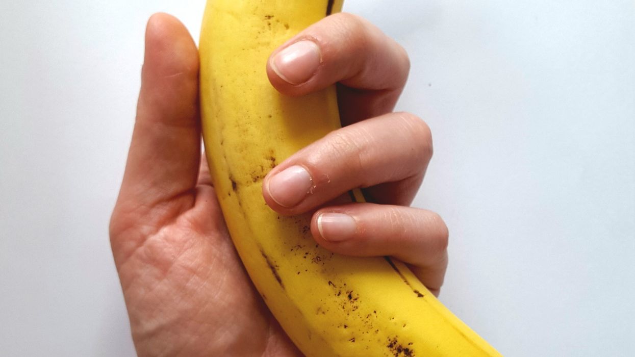 Hand holding banana