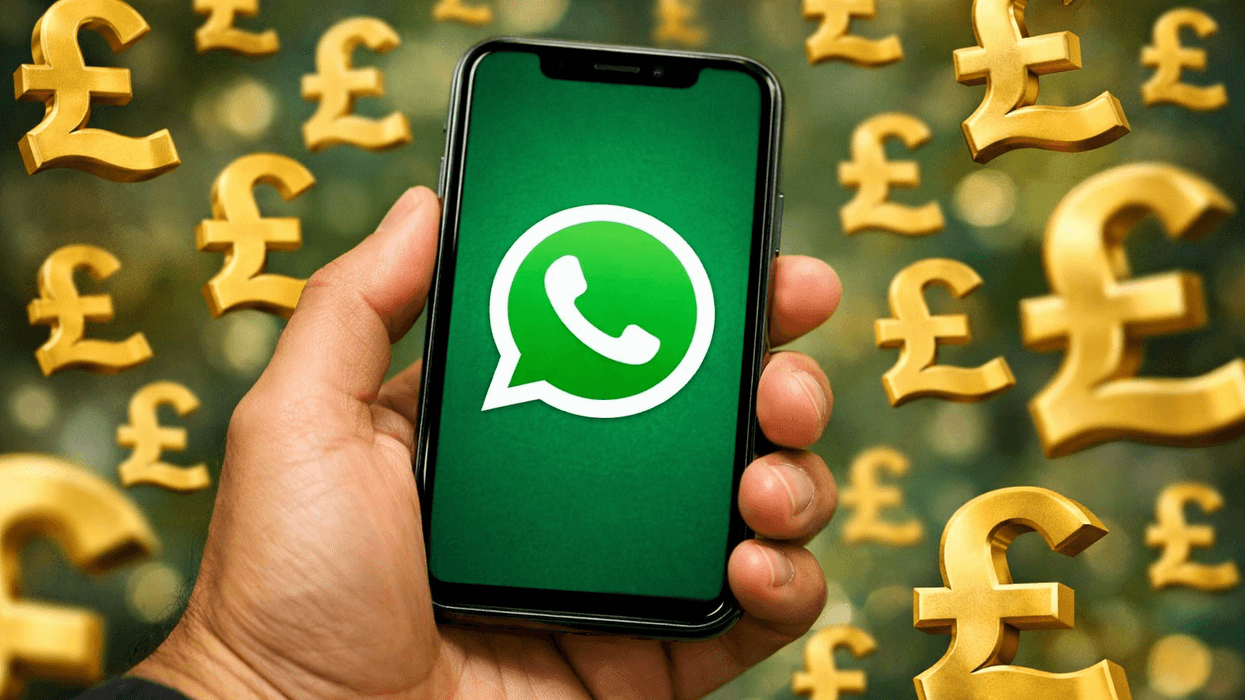 Hand holding mobile with WhatsApp British pound symbol surrounding it