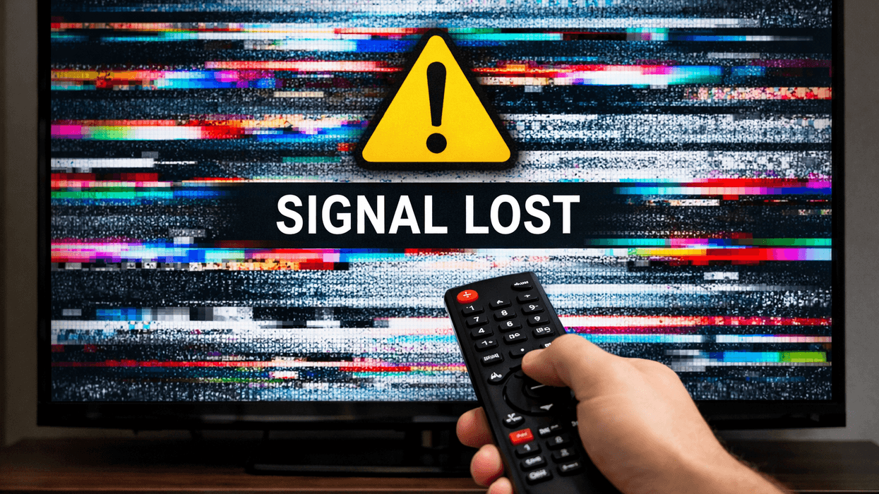 Hand holding remote in front of TV with a signal lost symbol