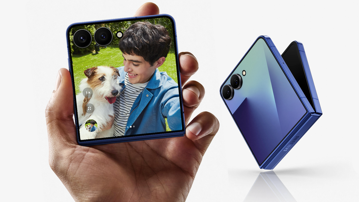 hand holding the galaxy z flip 7 with another foldable in the background