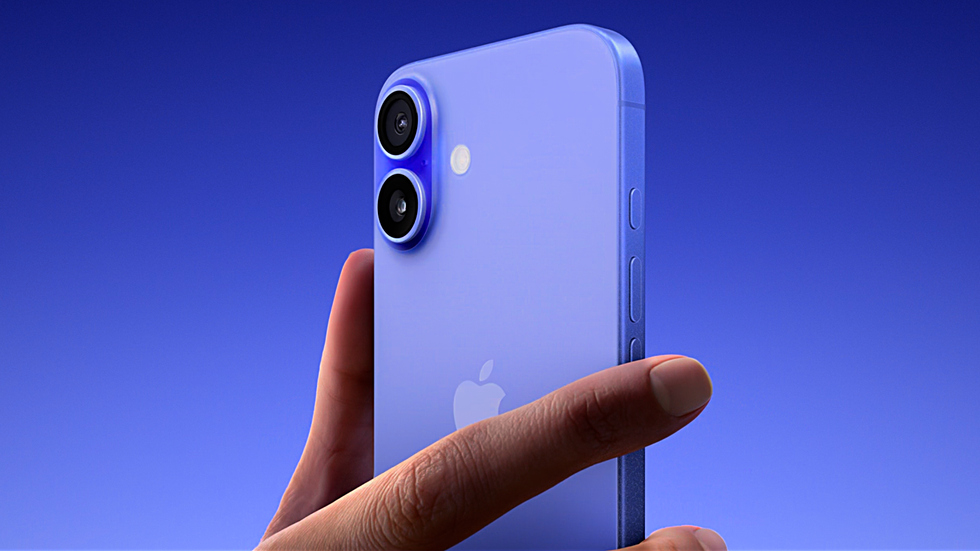 hand holding the iphone 16 in ultramarine showing off the new camera arrangement