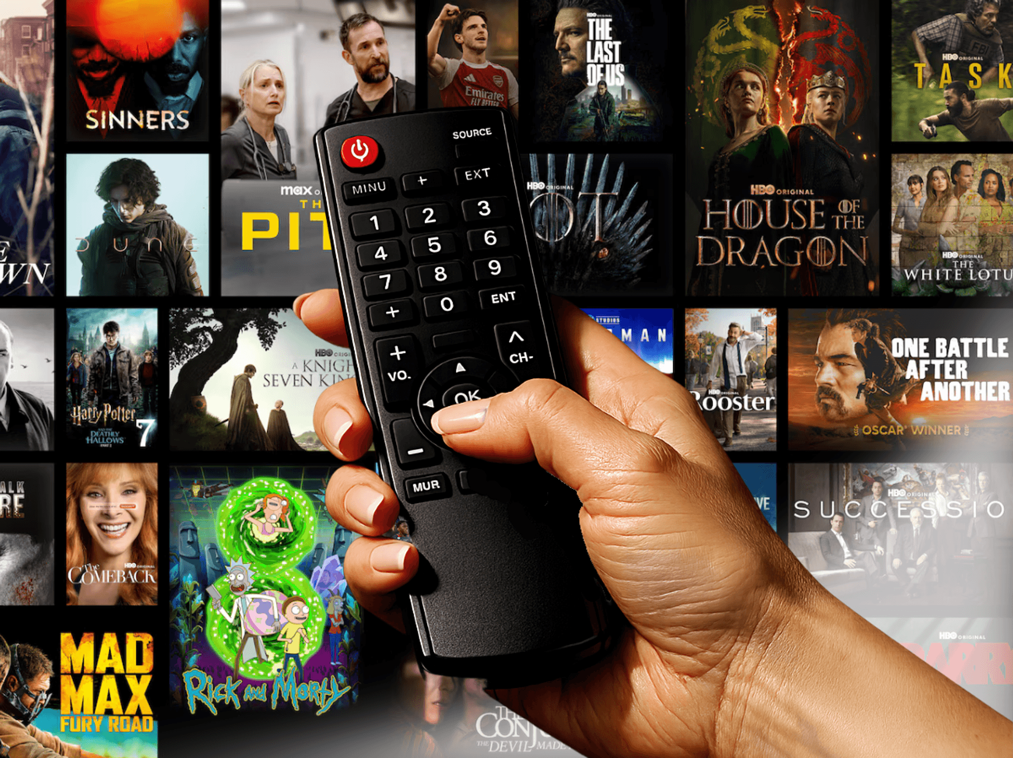 hand holds a tv remote with a selection from the HBO Max catalogue in the background