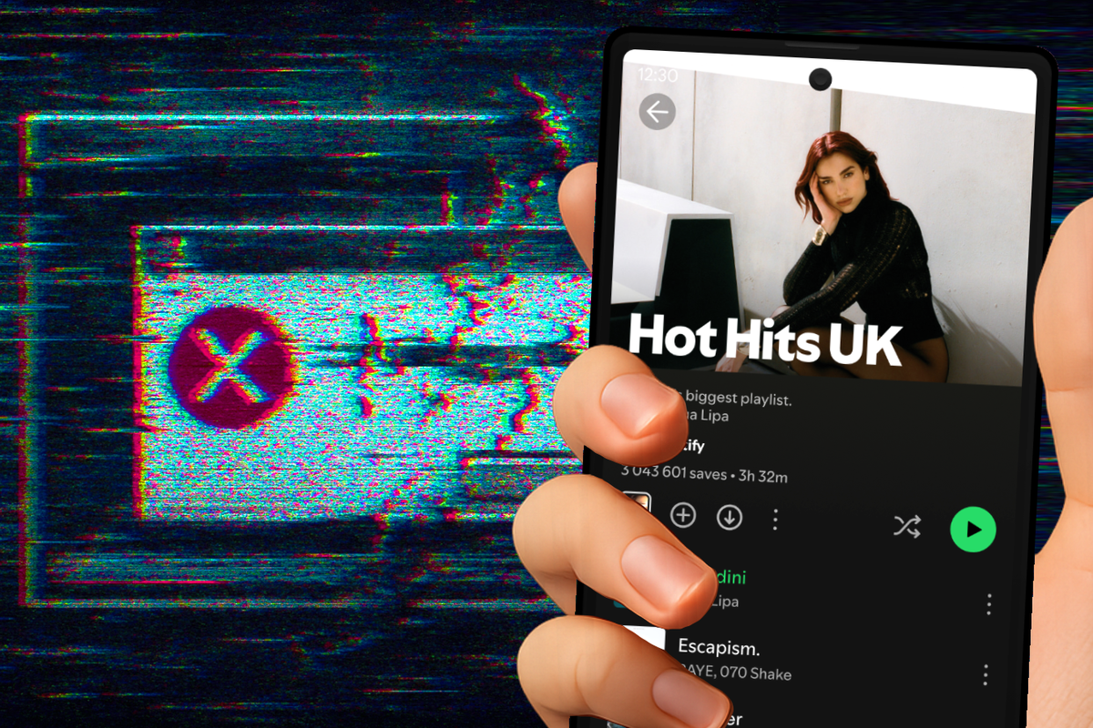 hand holds an Android smartphone with the Spotify app open and running