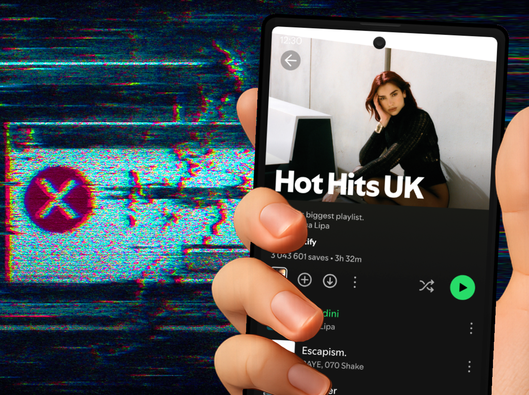 hand holds an Android smartphone with the Spotify app open and running
