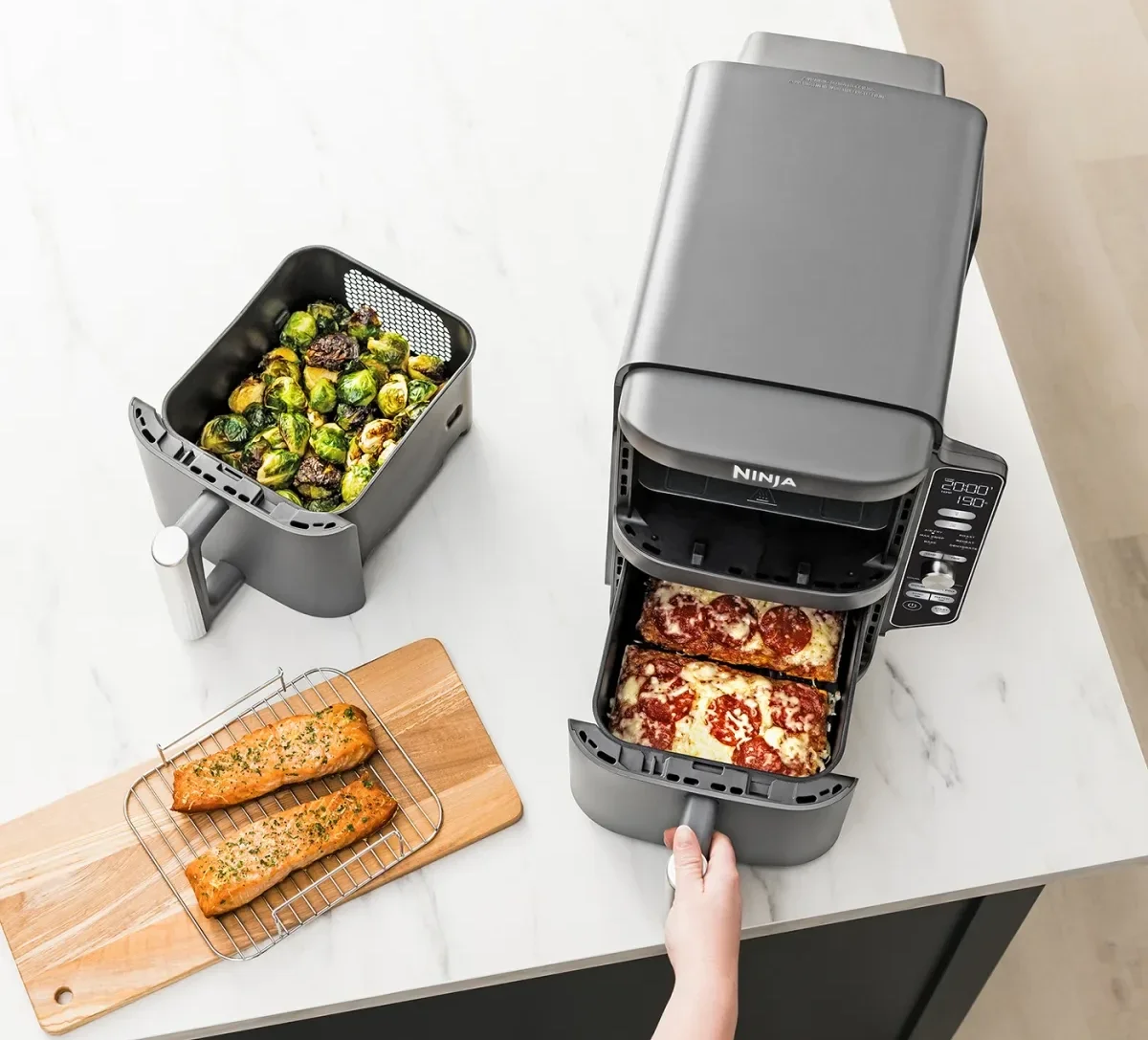 hand opens-up one of the drawers