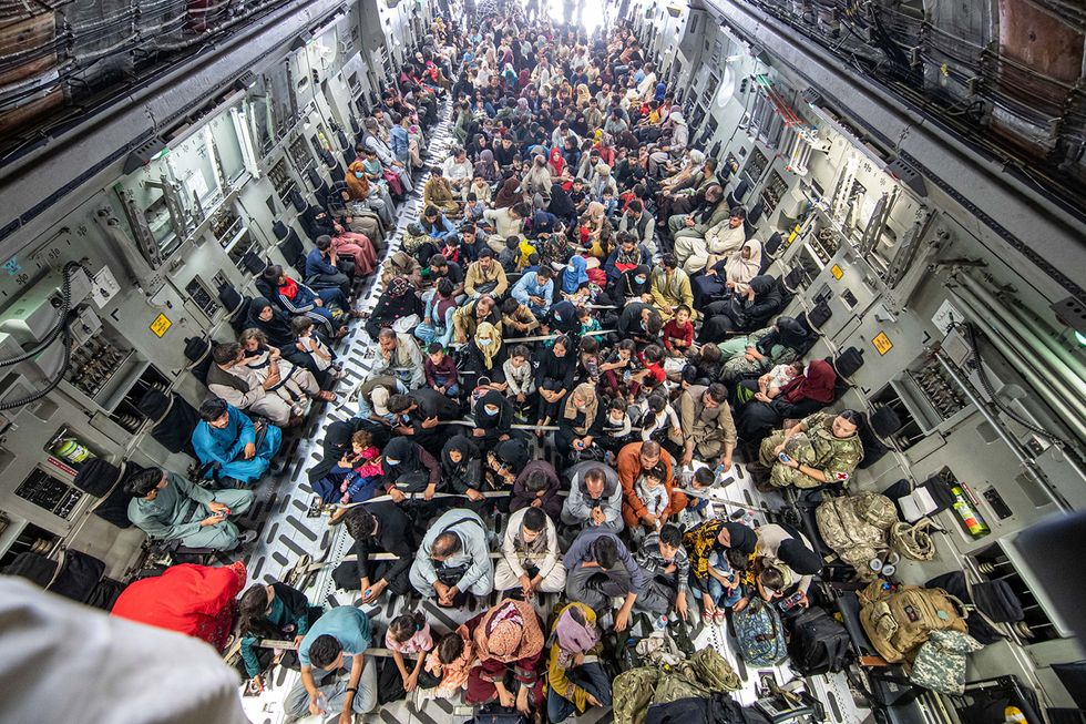 Handout file photo issued by the Ministry of Defence (MoD) of a full flight of 265 people supported by members of the UK Armed Forces on board an evacuation flight out of Kabul airport, Afghanistan. Issue date: Wednesday January 19, 2022.