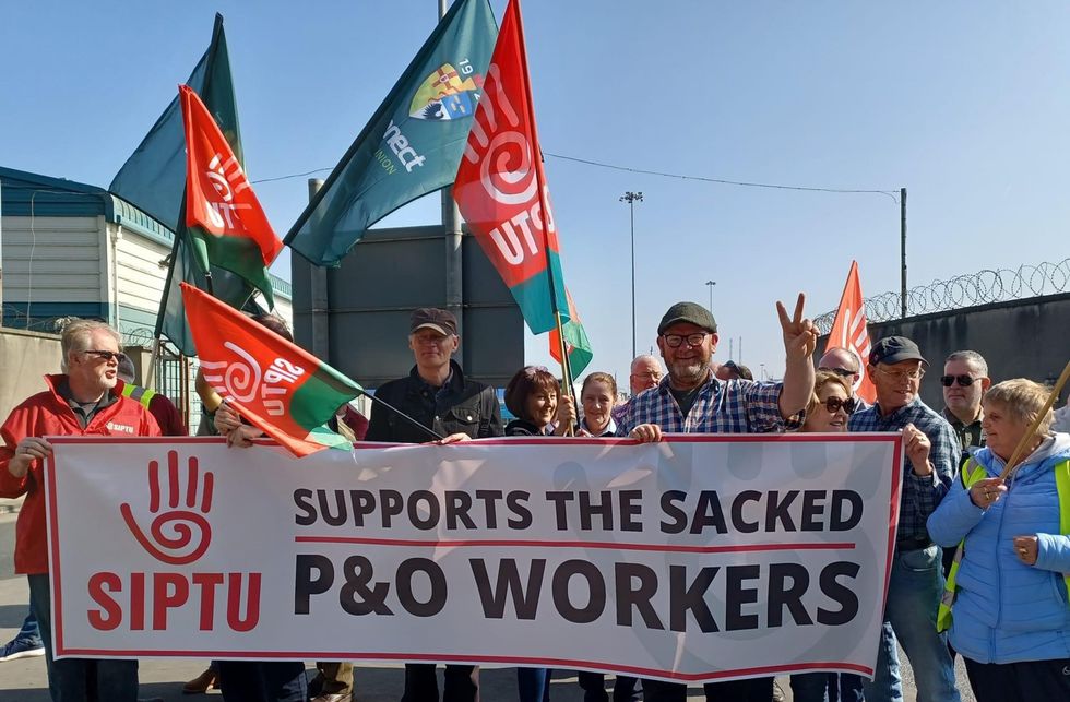 Handout photo courtesy of Siptu of Irish trade union workers during a rally at Dublin Port outside the P&O terminal to send support to the hunderds of seafarers sacked in recent days. Picture date: Saturday March 26, 2022.