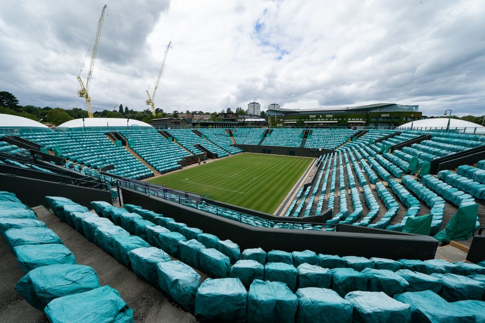 Handout photo dated 27/06/20 provided by the AELTIC of a general view of No. 2 Court overlooking Centre Court and the construction of the new indoor courts on Somerset Road at the All England Lawn Tennis Club on a stormy Saturday 27th June 2020 the weekend before The Championships were due to start on Monday 29th June 2020.