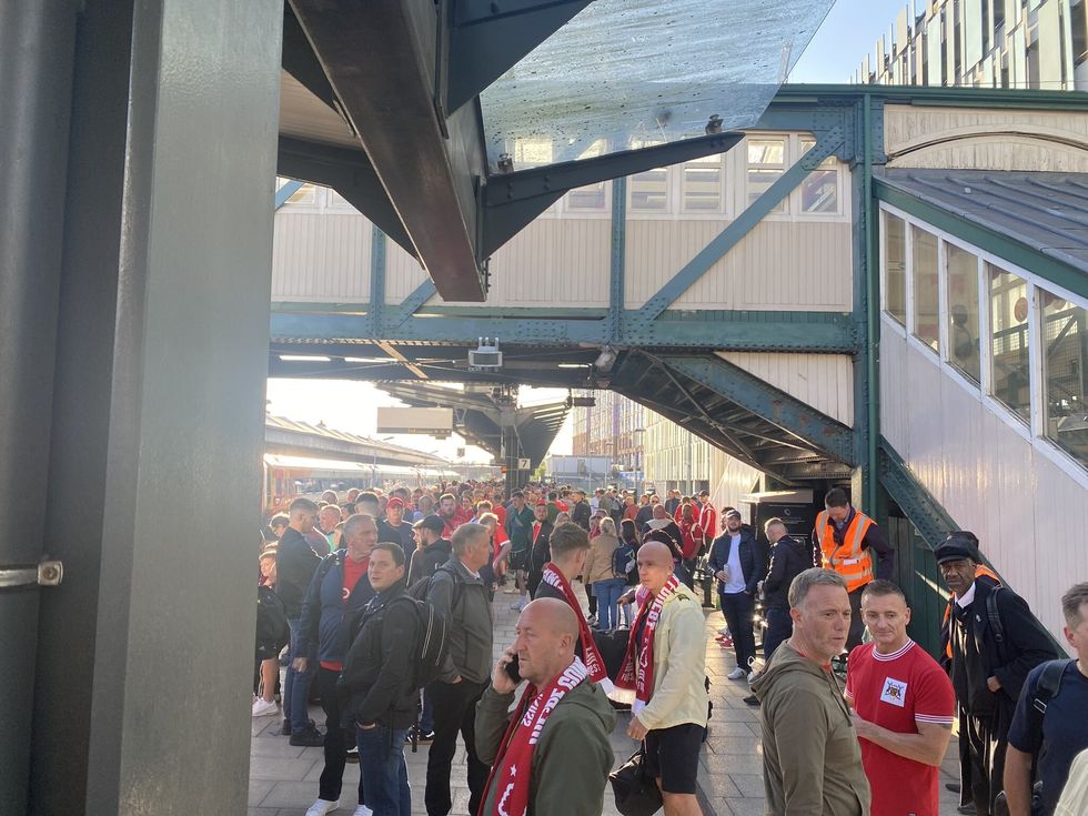 Handout photo issued by @andyrt1975 of Nottingham Forest fans at Nottingham railway station on Sunday as they make their way to London for the Championship play-off final. Hundreds of football fans were stuck queuing near the station as they struggled to get to the capital for the match. Picture date: Sunday May 29, 2022.