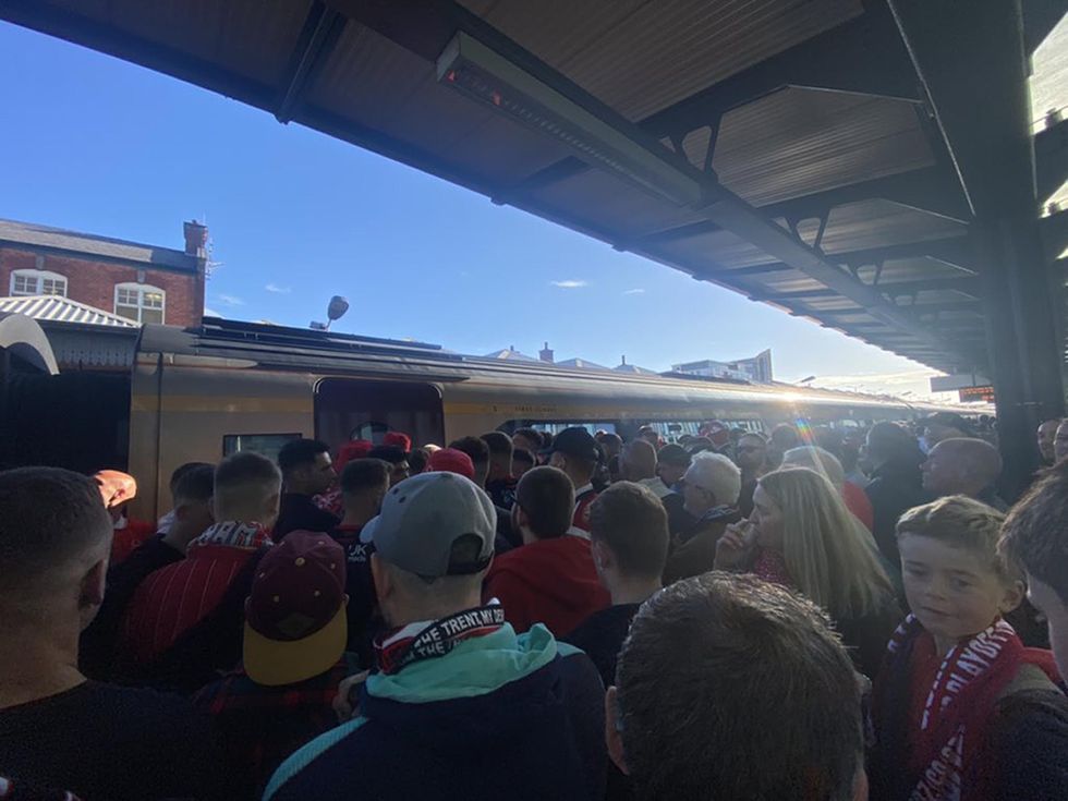 Handout photo issued by @andyrt1975 of Nottingham Forest fans at Nottingham railway station on Sunday as they make their way to London for the Championship play-off final. Hundreds of football fans were stuck queuing near the station as they struggled to get to the capital for the match. Picture date: Sunday May 29, 2022.