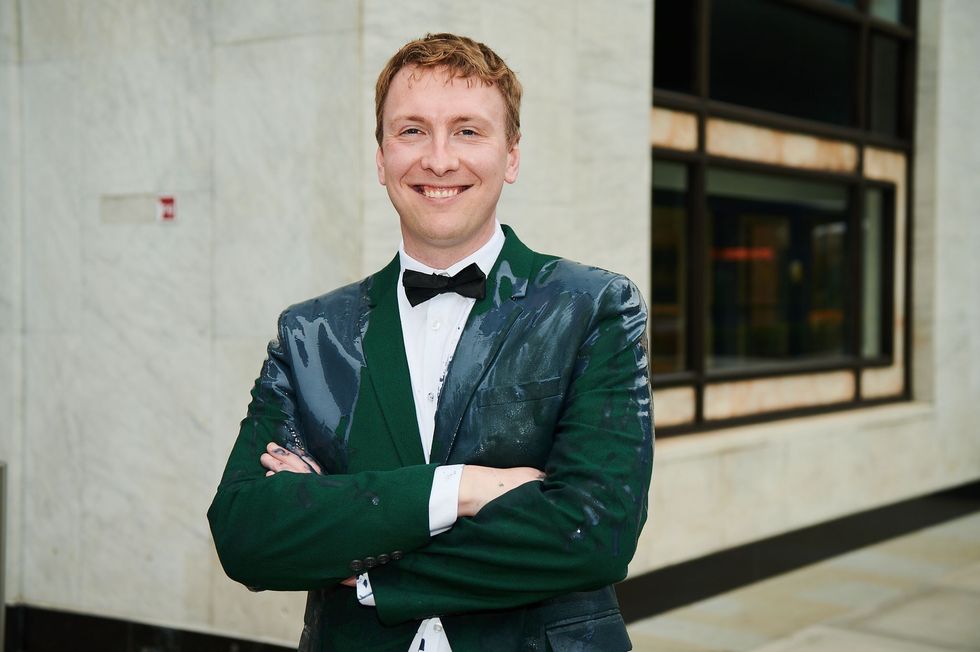 Handout photo issued by Channel 4 of Joe Lycett outside of Shell's Headquarters in London