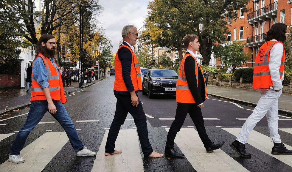 Handout photo issued by Just Stop Oil of protesters demonstrating on Abbey Road in London. Picture date: Sunday October 23, 2022.