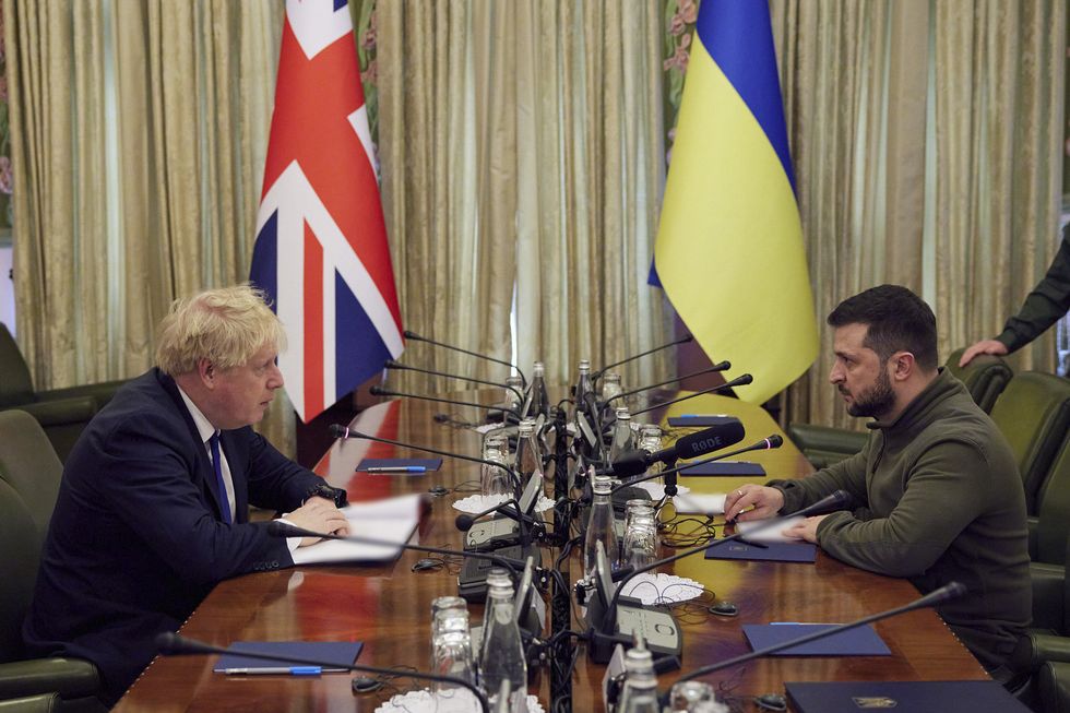 Handout photo issued by the Ukrainian Presidential Press Office of Prime Minister Boris Johnson (left) meeting Ukrainian President Volodymyr Zelensky in Kyiv, Ukraine. Picture date: Saturday April 9, 2022.