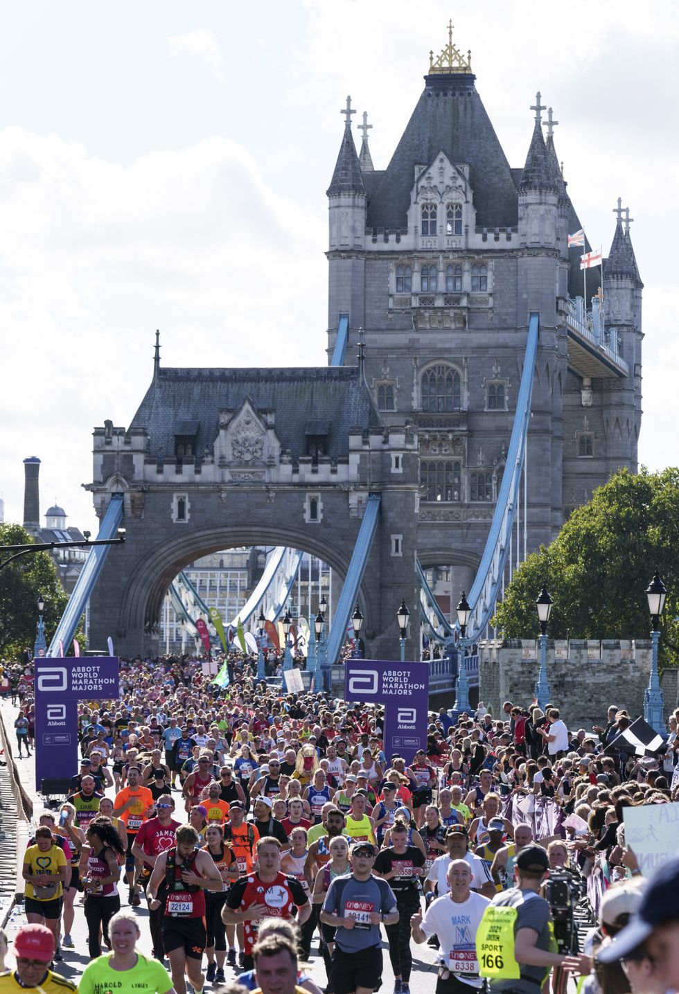 Handout photo issued by Virgin Money London Marathon of a general view of runners crossing Tower Bridge during The 2021 Virgin Money London Marathon. Issue date: Sunday October 3, 2021.