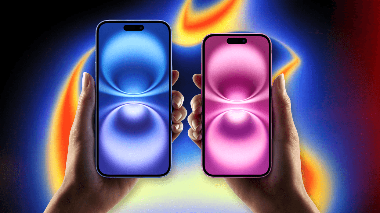 hands holding iPhone 16 Plus and iPhone 16 with the September Apple Event in the background