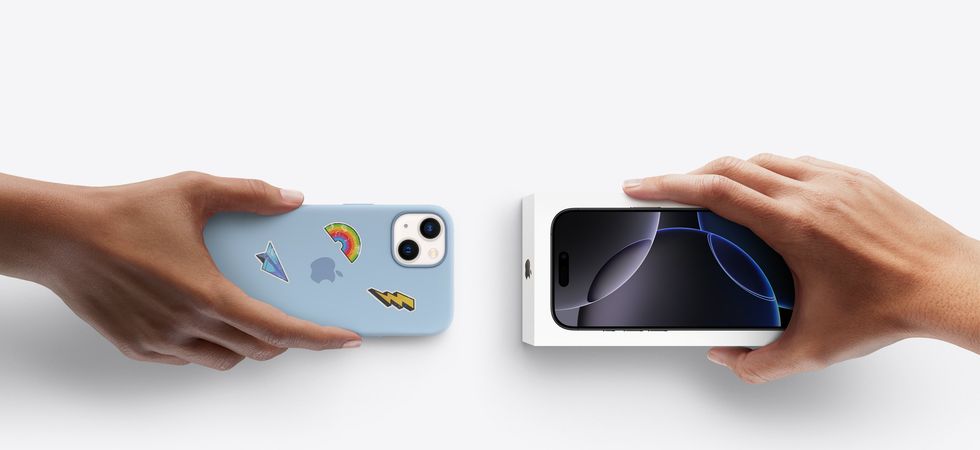 hands trade an older iphone with a customised case for a brand-new model in the box
