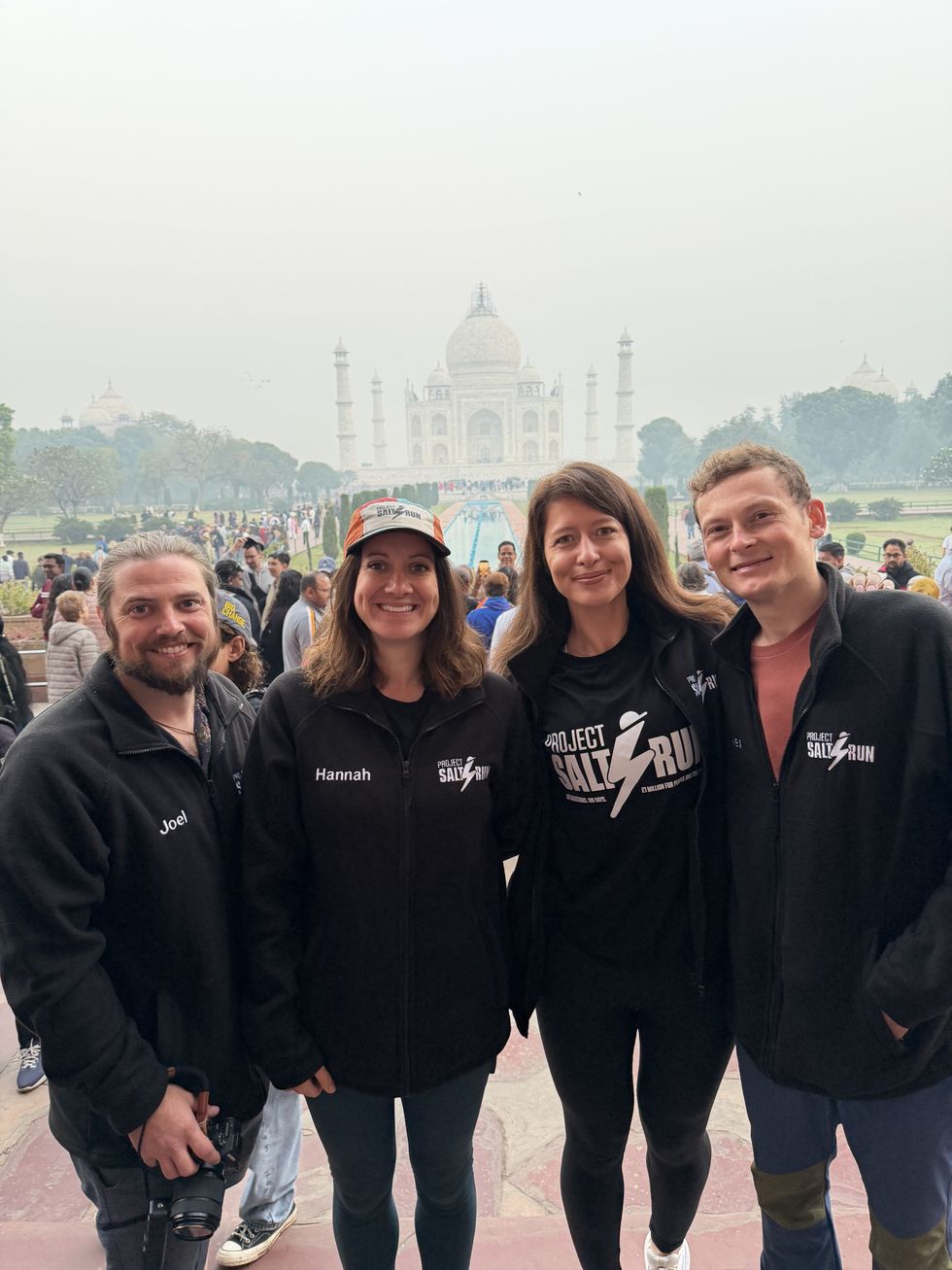 Hannah Cox, endurance runner with her team outside Taj Mahal