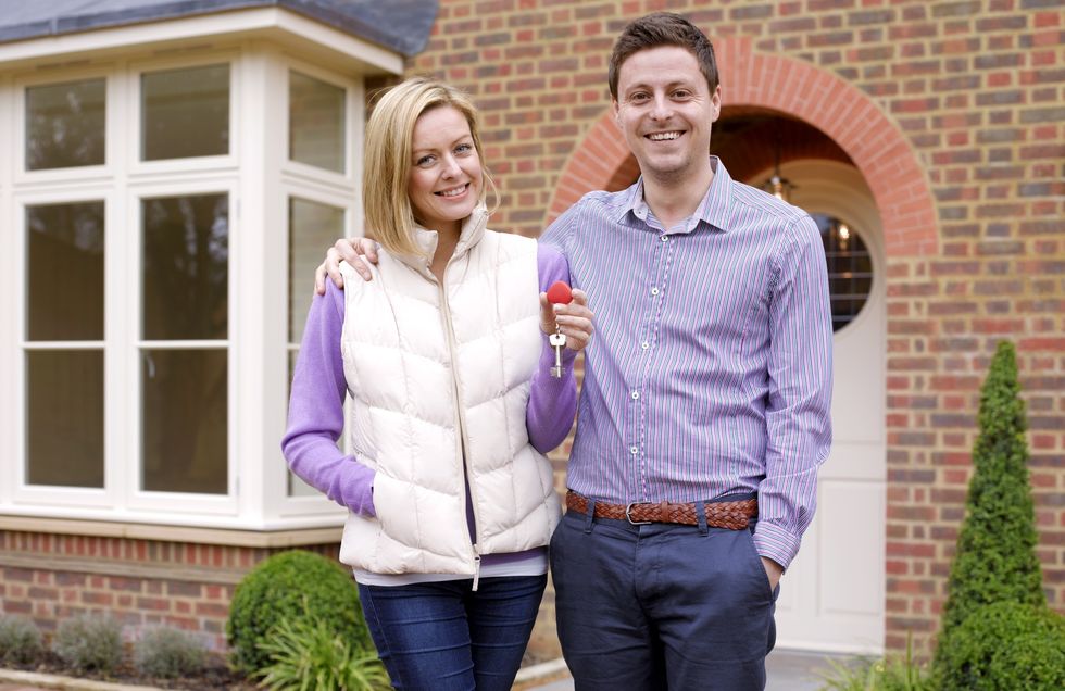 Happy couple moving into new house