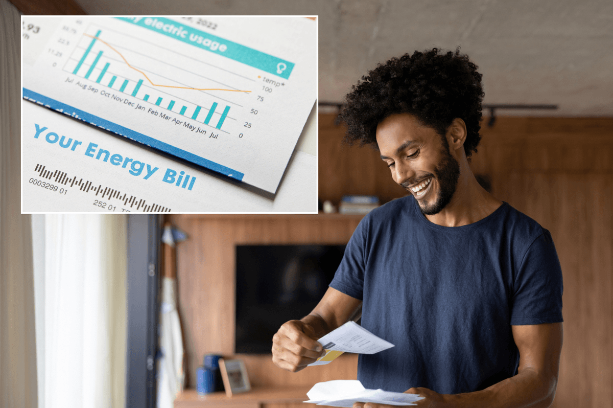 Happy person looking at energy bill