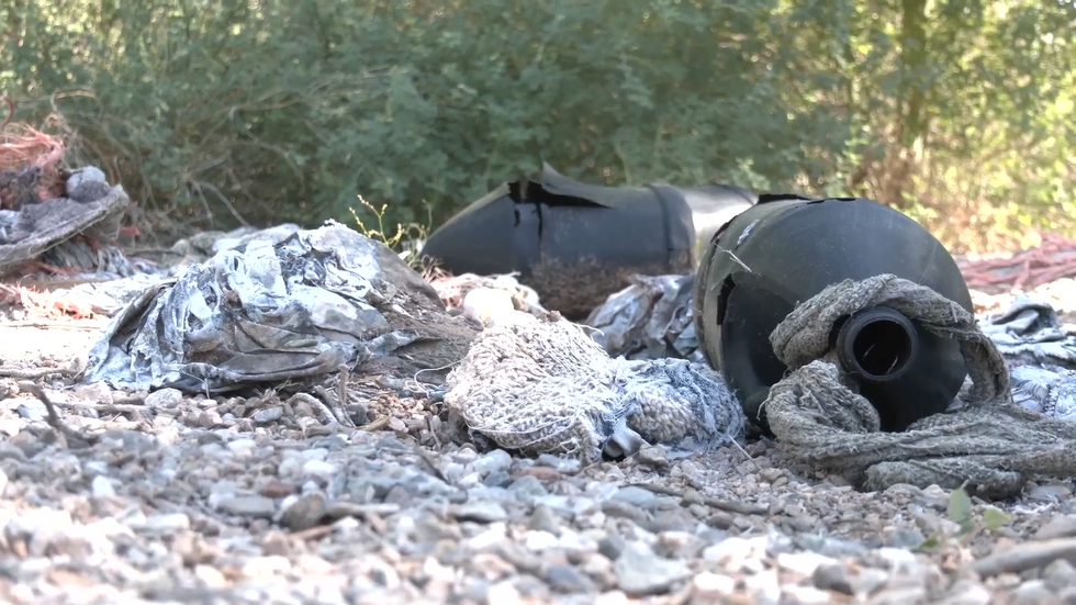Harnesses and bottles used to carry caches of drugs across the border into America