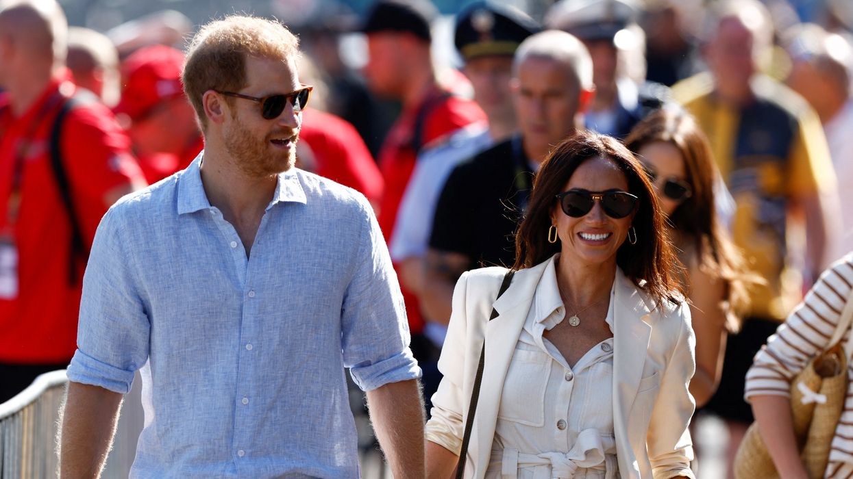 Harry and Meghan attending an event at the Invictus Games in Dussledorf, Germany