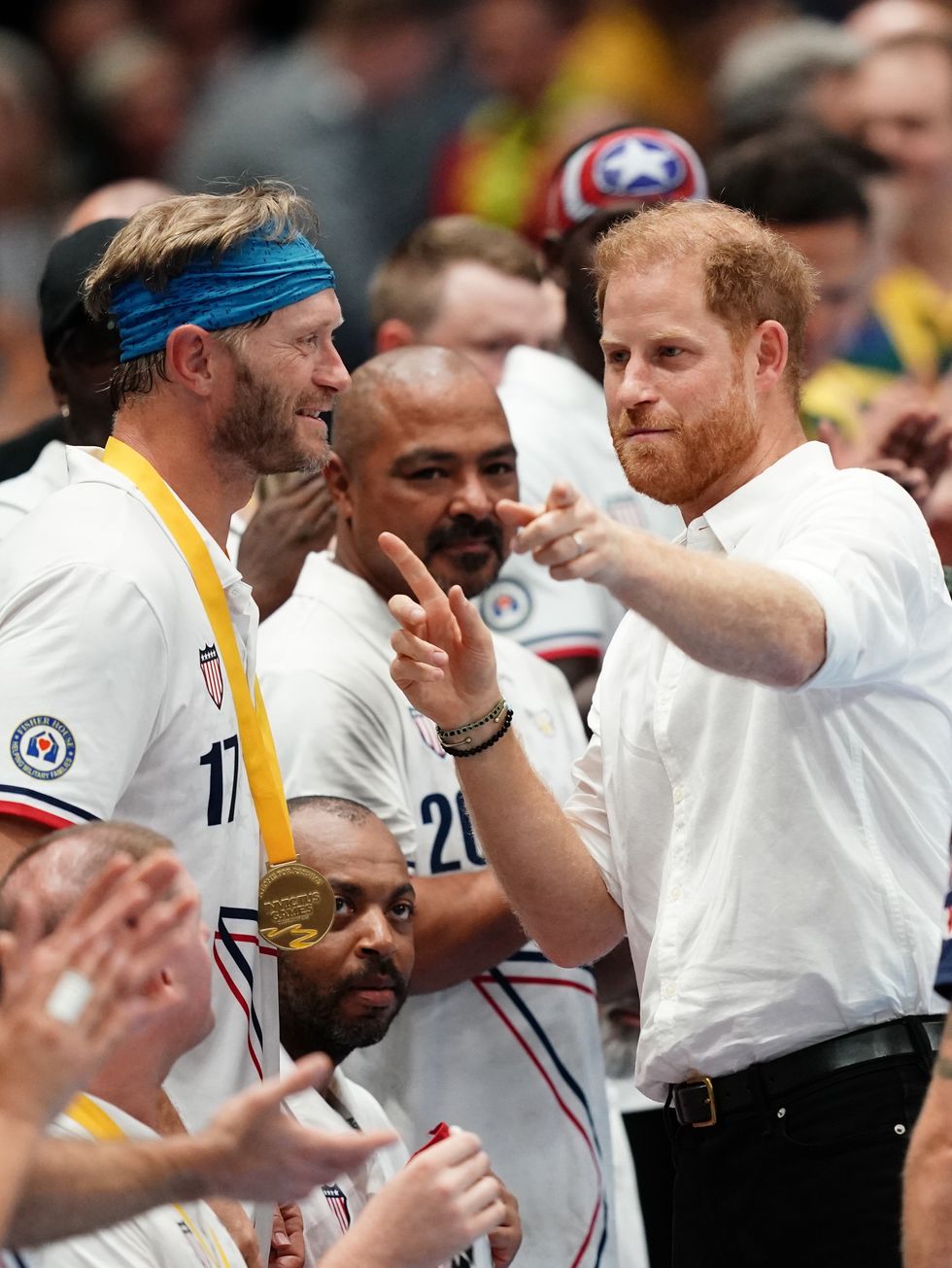 Harry awards medals to US team