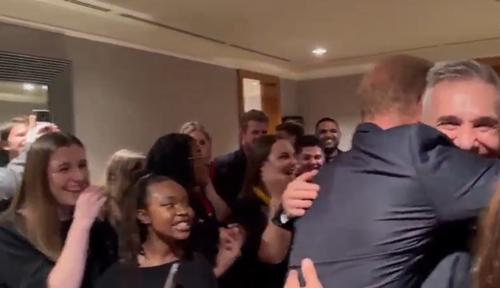 Harry hugging the conductor