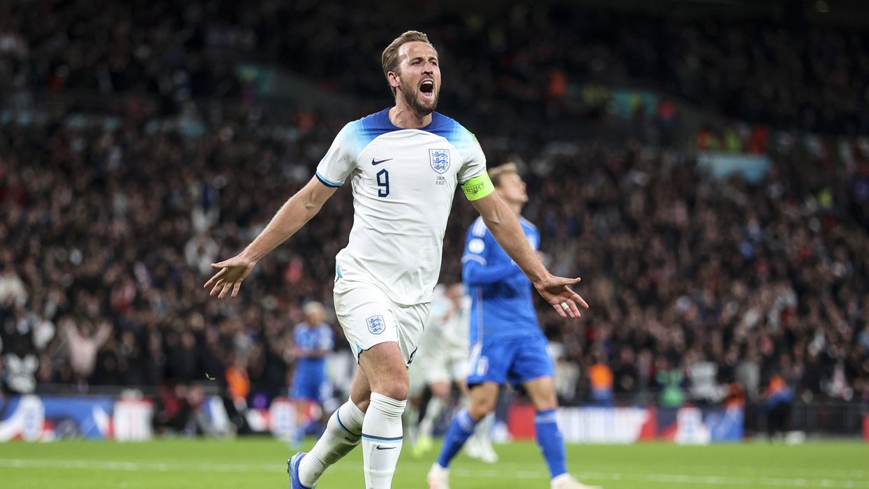 Harry Kane of England celebrates after he scores a goal to make it 3-1 during the UEFA EURO 2024 European qualifier match between England and Italy