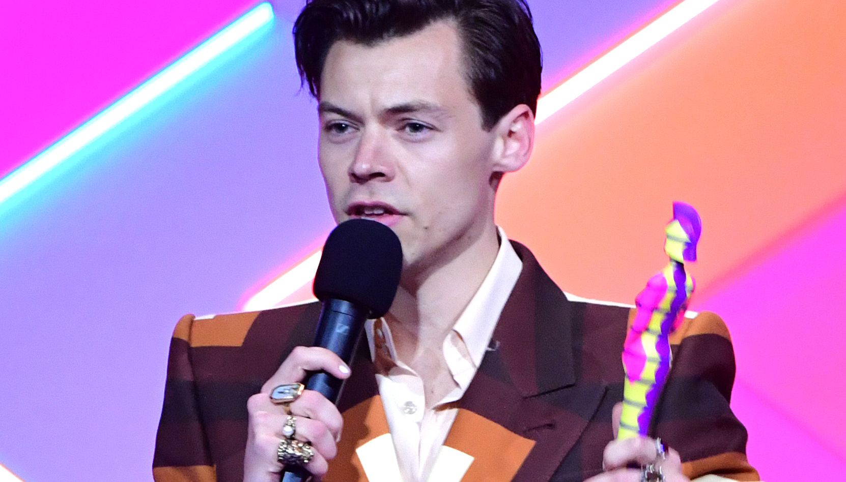 Harry Styles accepts the award for Best Single during the Brit Awards 2021 at the O2 Arena.