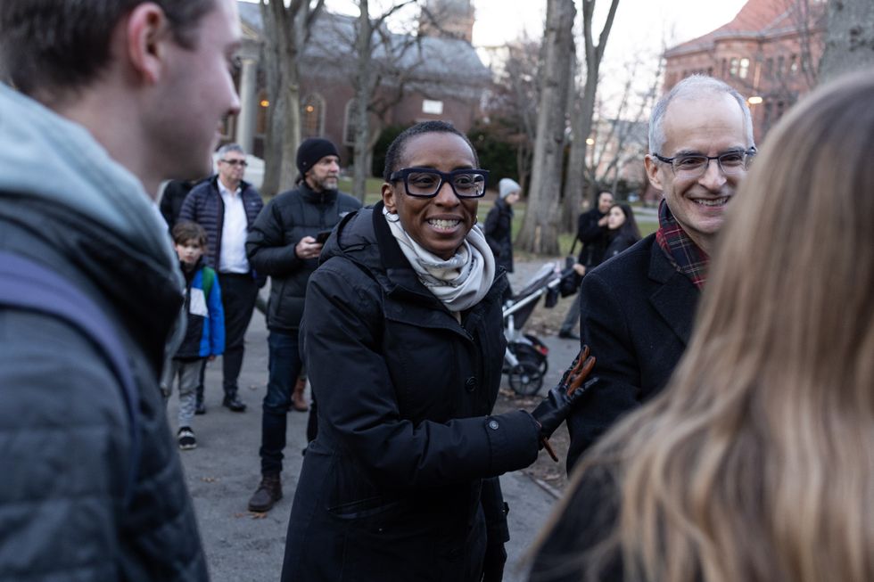 Harvard President Claudine Gay (2nd L) attends a menorah lighting ceremony on the seventh night of Hanukkah with the University's Jewish community