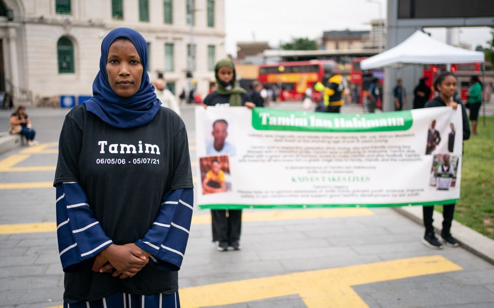 Hawa Haragakiza, mother of Tamim Ian Habimana, 15, attends a vigil in General Gordon Square, Woolwich, London, to remember her son who was stabbed to death, and to help raise awareness of knife crime.