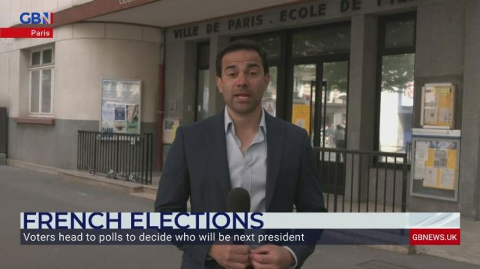 French voters head to the polls as Macron's battle with Marine Le Pen for presidency reaches pinnacle