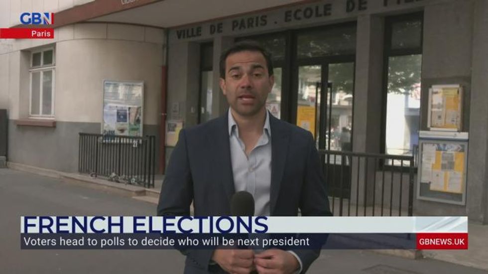 French voters head to the polls as Macron's battle with Marine Le Pen for presidency reaches pinnacle