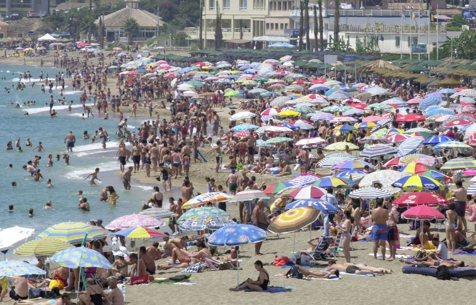 he crowded beach at Benalmadena on the Costa Del Sol in Spain