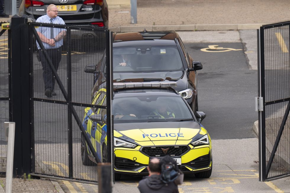 He was escorted away by police