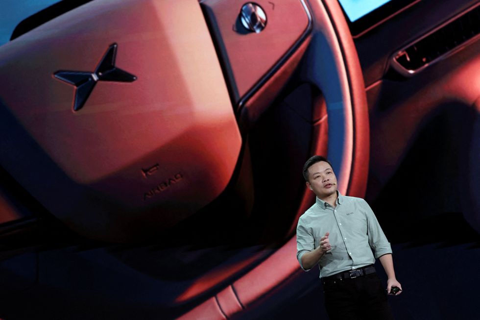 He Xiaopeng, CEO of XPeng, speaks at a launch event for the MONA M03 EV