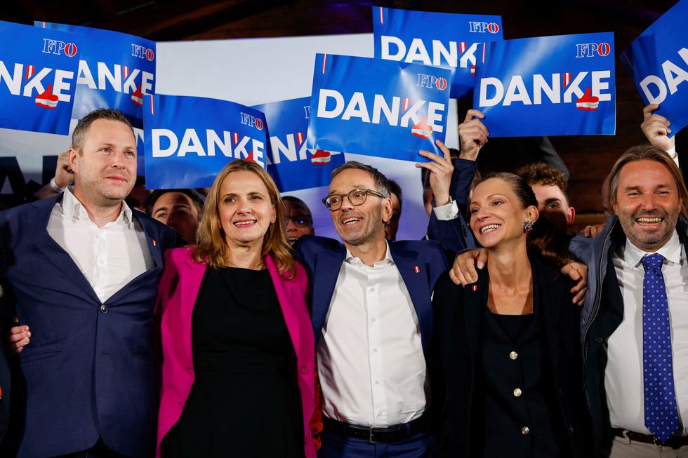 Head of Freedom Party (FPOe) Herbert Kickl poses with people