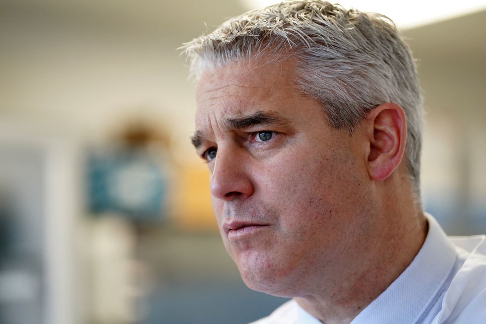 Health Secretary Steve Barclay (left) at the Ralph Lauren Centre for Breast Cancer Research during a visit to the Royal Marsden Hospital in London, he has urged the nursing union to %22come back to the table%22 for talks but he is declining to discuss pay, instead wanting to talk about conditions such as pension arrangements, holidays, rosters and the availability of free coffee. Picture date: Monday November 28, 2022.