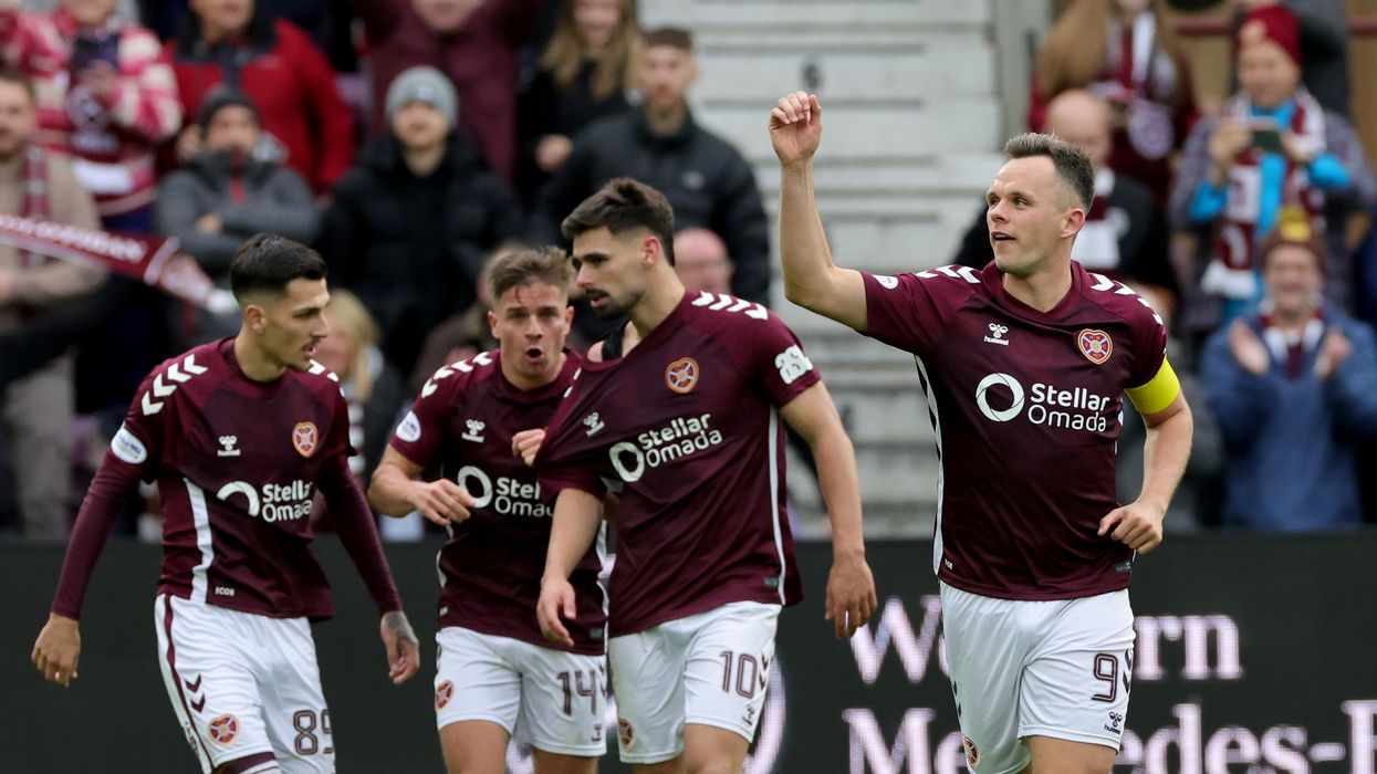 Hearts shocked the champions to go eight points clear at the top of the table
