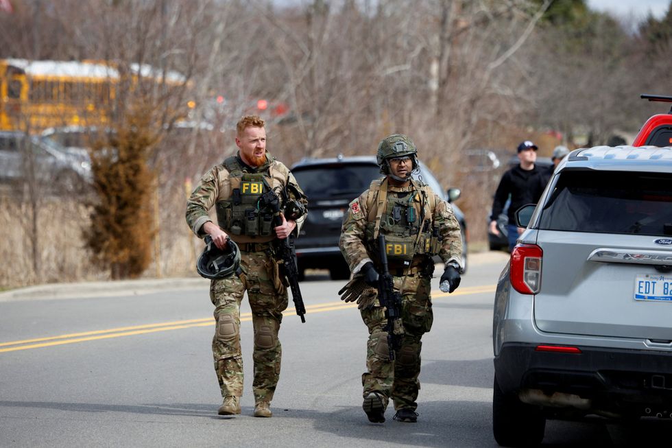 Heavily-armed FBI agents on the scene in Michigan