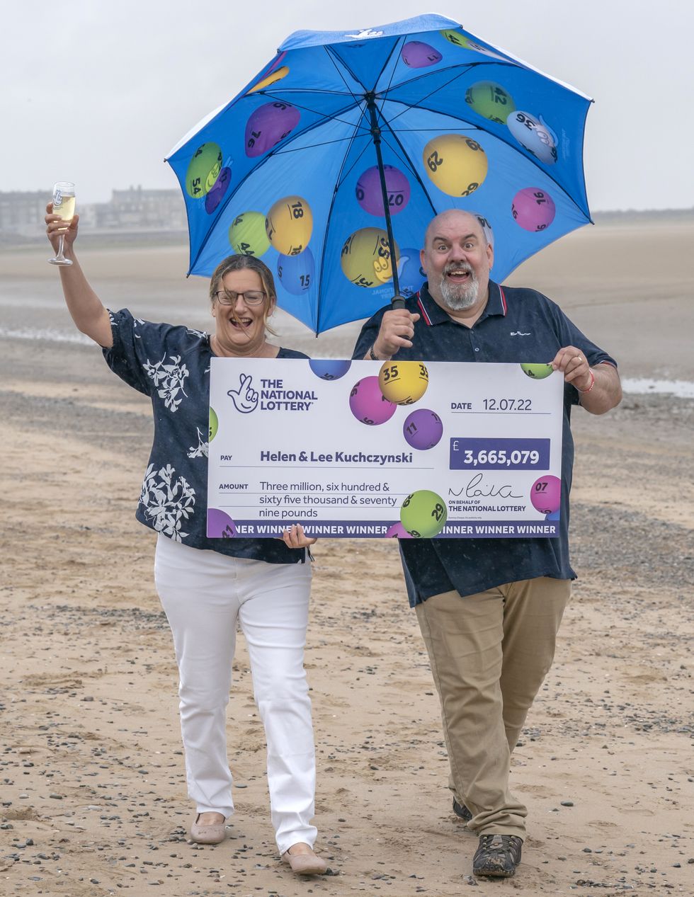 Helen and Lee Kuchczynski, from Cumbria, during a photo call to celebrate their 3.6 million EuroMillions win, in Morecambe, Lancashire. Picture date: Friday July 22, 2022.