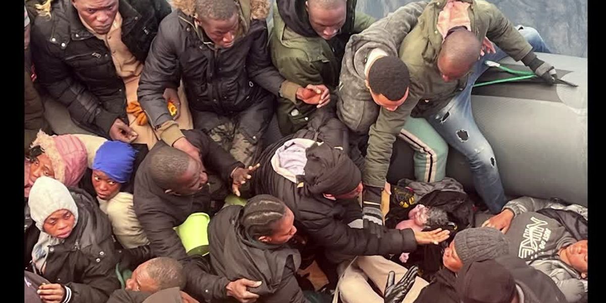 NextImg:Baby boy born on crowded small boat as mother lies on floor among 60 migrants rescued from rubber dinghy
