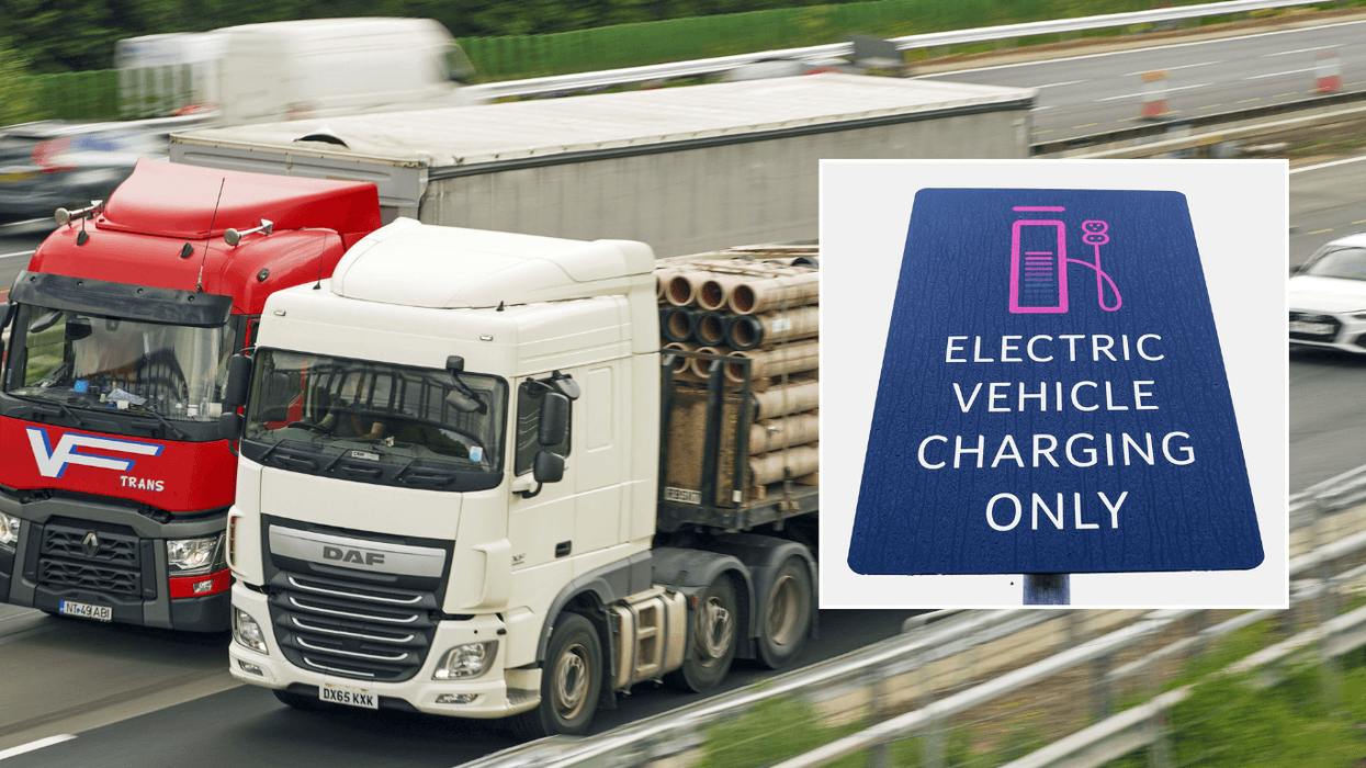 HGVs on road and electric vehicle charging sign
