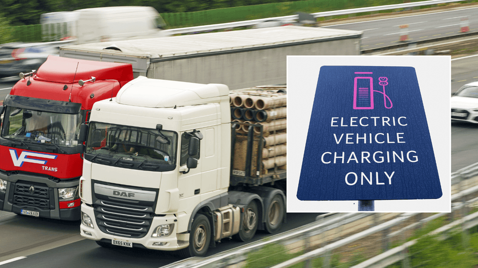 HGVs on road and electric vehicle charging sign