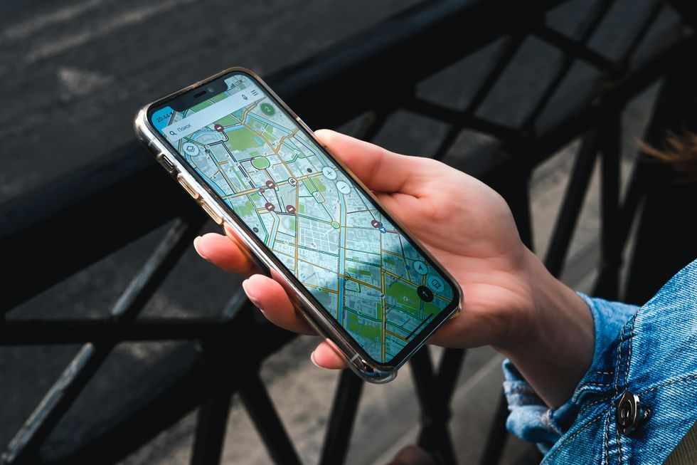 Holding phone with a maps app open
