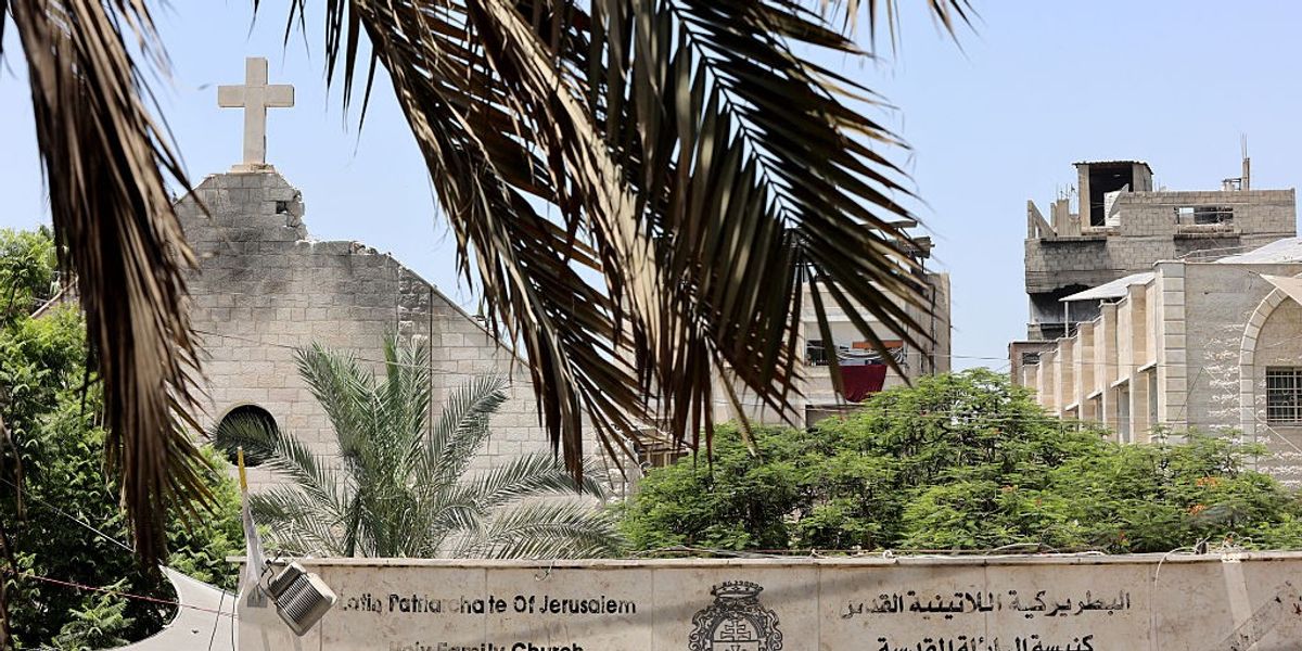 NextImg:Two people dead and one priest injured after Catholic Church was blown up by Israeli tank in Gaza