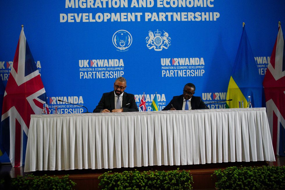 Home Secretary James Cleverly and Rwandan Minister of Foreign Affairs Vincent Biruta sign a new treaty, in Kigali, Rwanda,