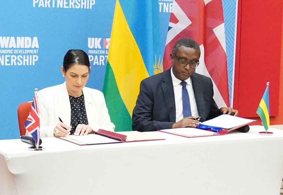 Home Secretary Priti Patel and Rwandan minister for foreign affairs and international co-operation, Vincent Biruta, signed a \%22world-first\%22 migration and economic development partnership.