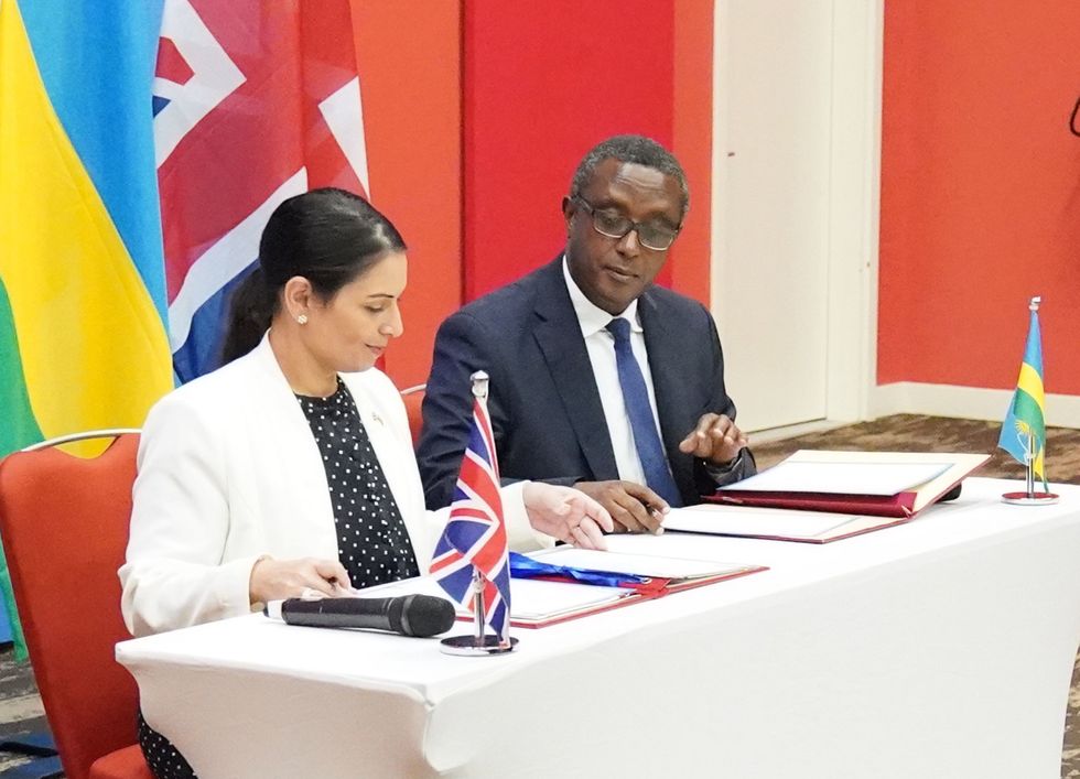 Home Secretary Priti Patel and Rwandan minister for foreign affairs and international co-operation, Vincent Biruta, signed a \%22world-first\%22 migration and economic development partnership in the East African nation's capital city Kigali.