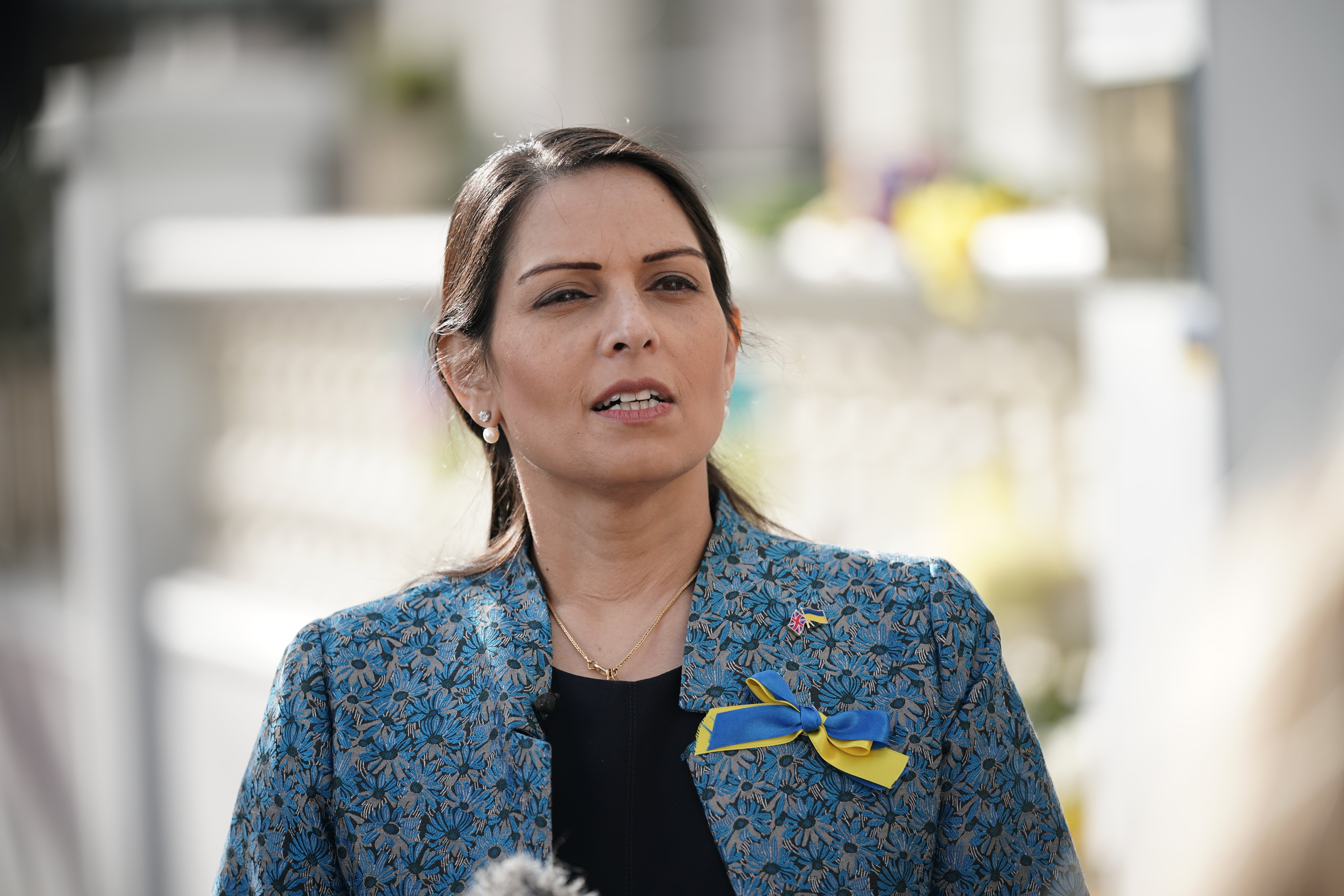 Home Secretary Priti Patel speaking to the media outside the Ukrainian embassy in London.